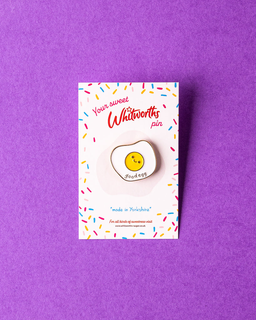 Good Egg pin on backing card