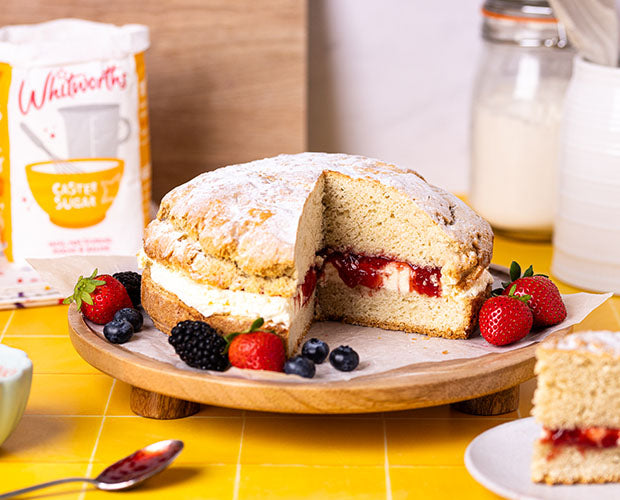 Giant scone filled with cream and strawberry jam