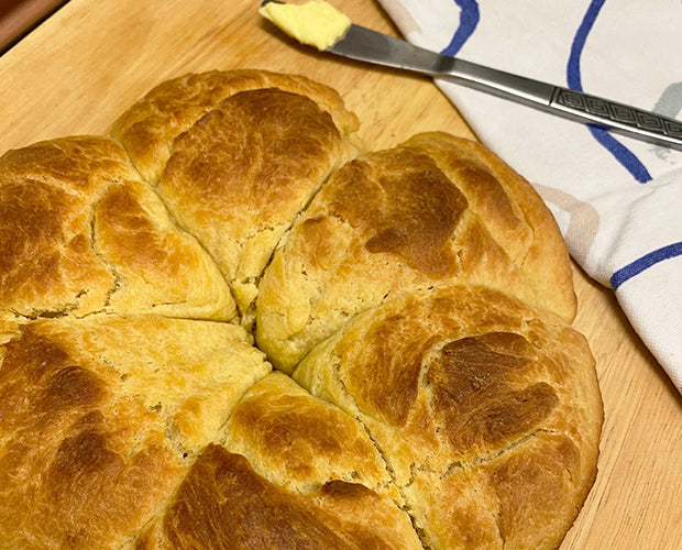 a golden French brioche with butter