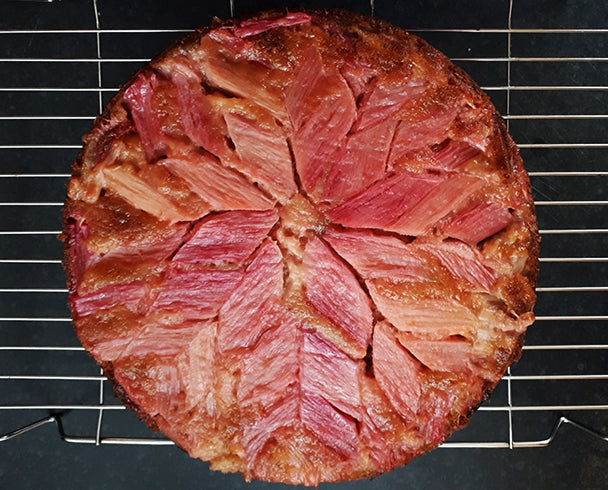 a rhubarb up-side down tart on a metal tray