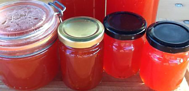 Glass jars containing sweet chilli jam