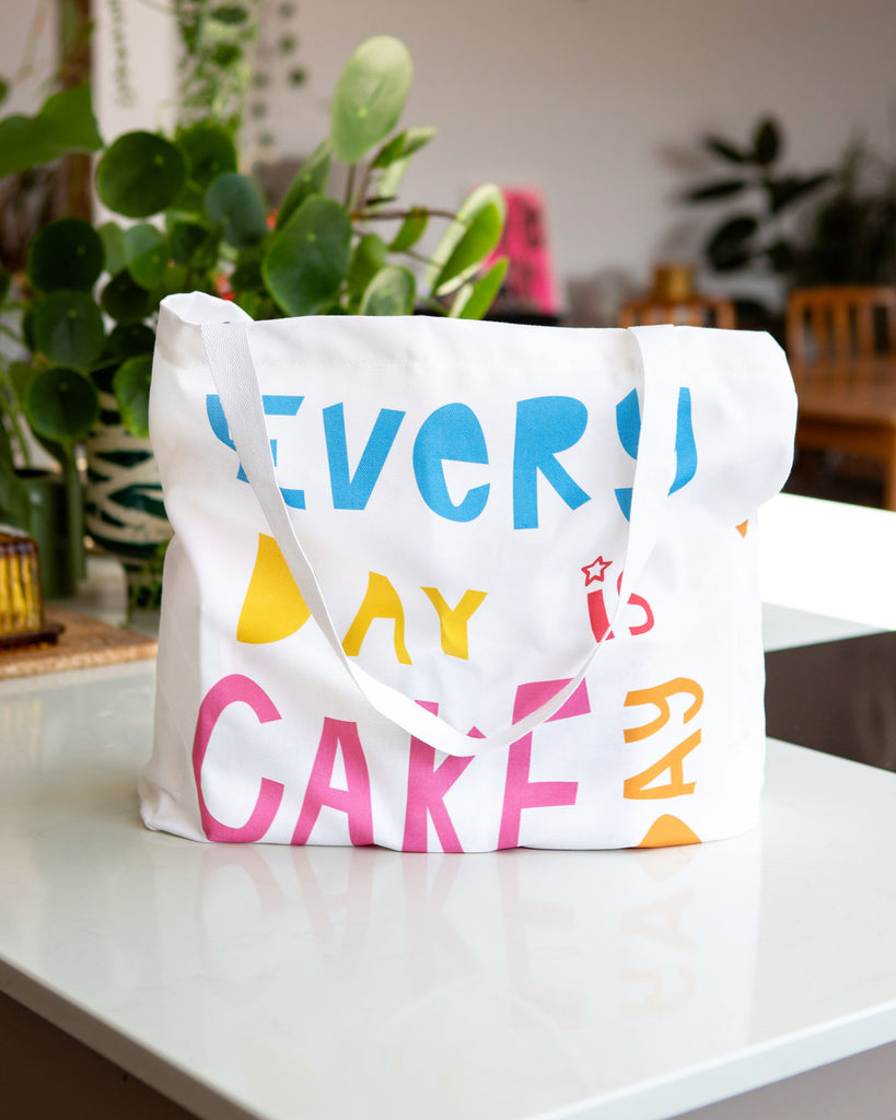 Image of Everyday is cake day tote bag filled with sugars